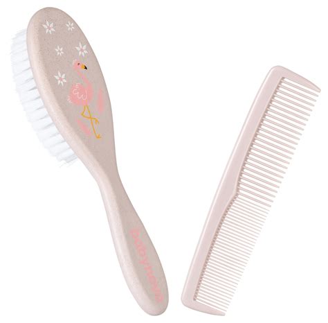 Eine weiche Babybürste mit Naturborsten, die zur sanften Haarpflege verwendet wird.