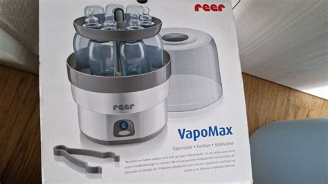Detailansicht des VapoMax S mit herausnehmbarer Zubehörschale und Flaschenhalterungen