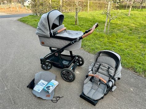 Schema zur Unterscheidung von Hartan Kinderwagenmodellen basierend auf Gestelltyp und Radkonfiguration