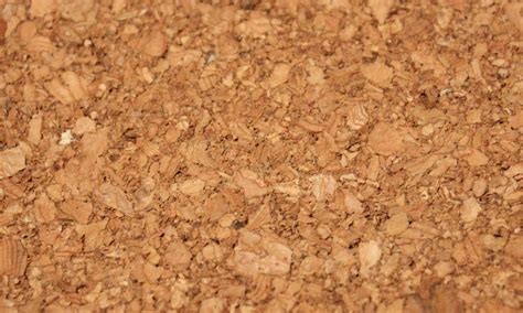 Nahaufnahme von Naturmaterialien wie Bio-Baumwolle und Kork, die im Naturkind Lux Evo verwendet werden