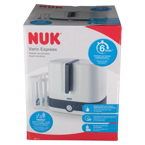 Schema des NUK Vario Express Dampf-Sterilisators mit hervorgehobenen Komponenten wie Wasserbehälter, Körbe und Stäbe