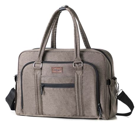 Design einer stilvollen LÄSSIG Wickeltasche mit verschiedenen Fächern und einer integrierten Wickelunterlage