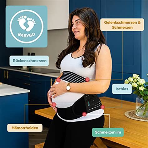 Eine schwangere Frau mit einem Beckengurt zur Entlastung der Symphyse.