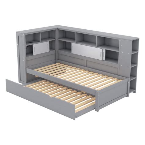 Skizze eines Kinderbettes mit ausgezogenem Gästebett und Montagemöglichkeiten für den Rausfallschutz