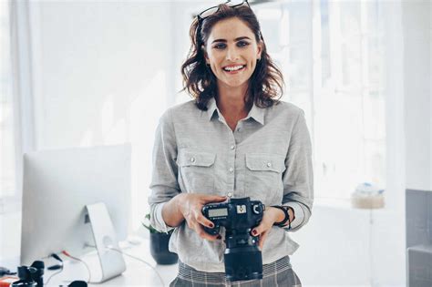 Fotografin mit Neugeborenem