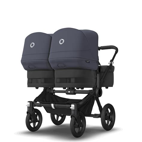 Bugaboo Donkey 5 im Zwillingsmodus, mit zwei Sitzeinheiten nebeneinander.