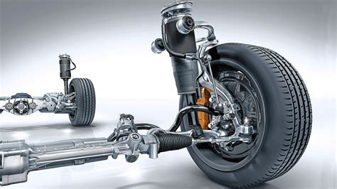 Detailaufnahme der Federung und der großen Räder eines MOON Buggys, die Unebenheiten auf einem Feldweg dämpfen.