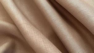 Nahaufnahme der Stoffstruktur eines Theraline Stillkissenbezugs mit Peach-Finish