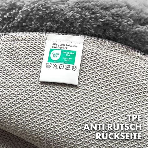 Detailaufnahme des reflektierenden Streifens und der rutschfesten Rückseite des ABC Design Fußsacks