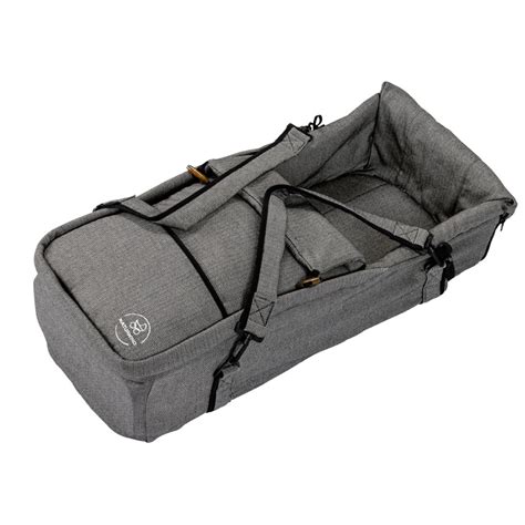 Illustration eines Naturkind Kinderwagens mit angebrachtem Tragenest