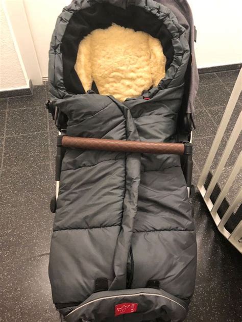 Vergleich von Lammfell-, Thermo- und Standard-Babyschalen-Fußsäcken.